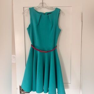 Elegant Teal Sleeveless Dress with Pink Leather Belt